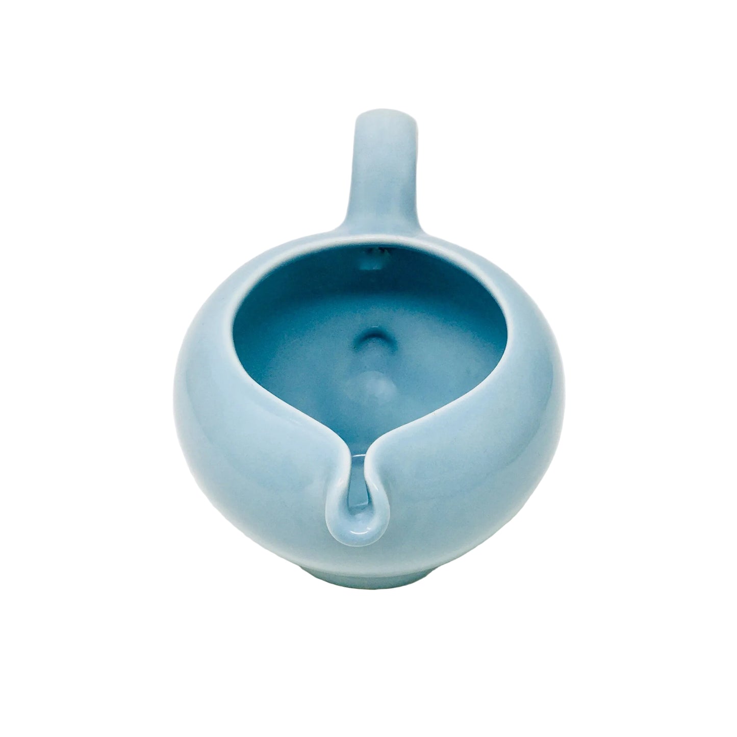 Blue ceramic pitcher on a white background