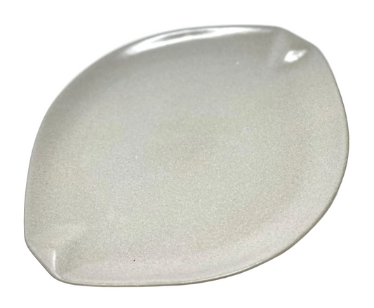 White ceramic plate on a white background